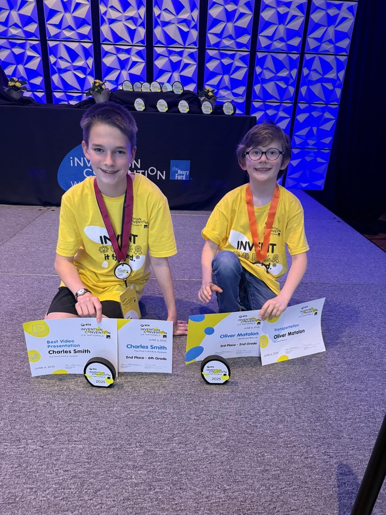 Charles and Oliver with awards at Invention Convention U.S. Nationals