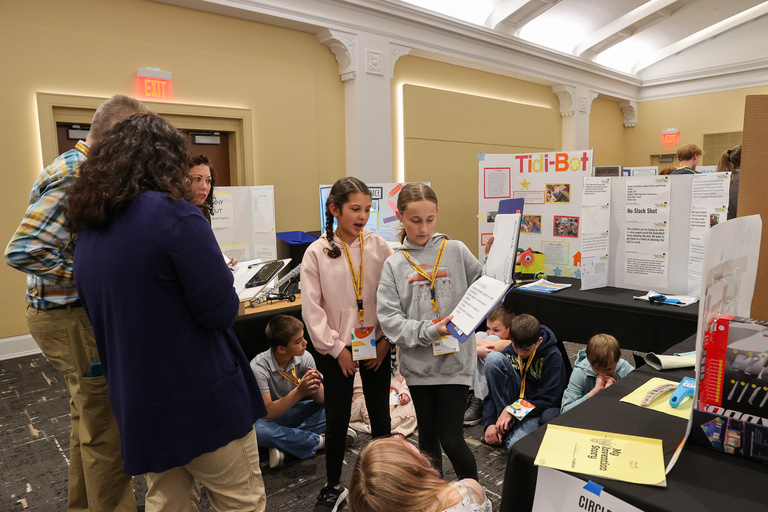 Student presenting at Iowa Invention Convention State Finals 2026