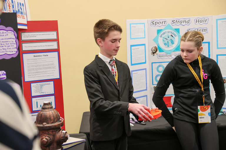 Student presenting at Iowa Invention Convention State Finals 2026
