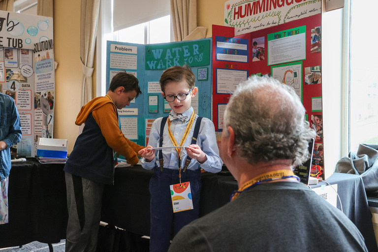 Student presenting at Iowa Invention Convention State Finals 2026