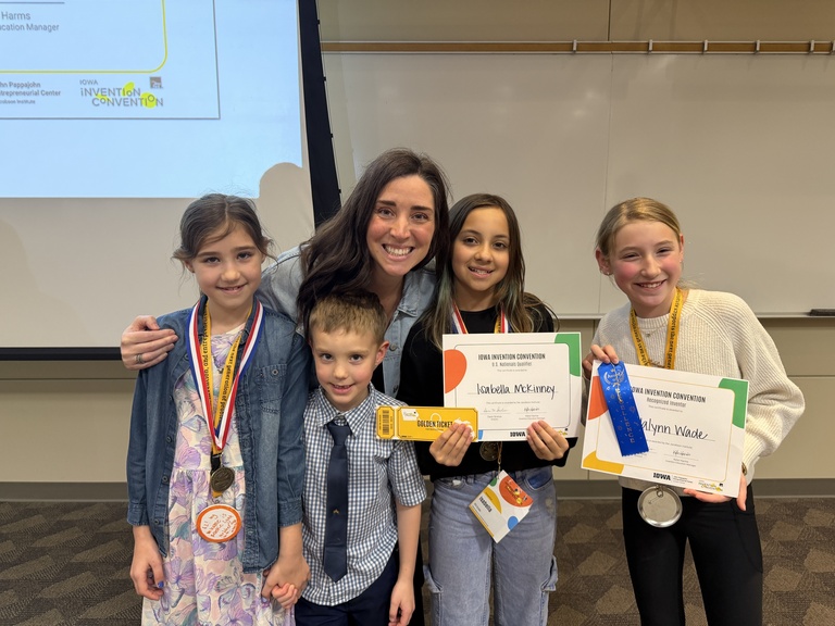 Invention coach, Mandy, with her four students