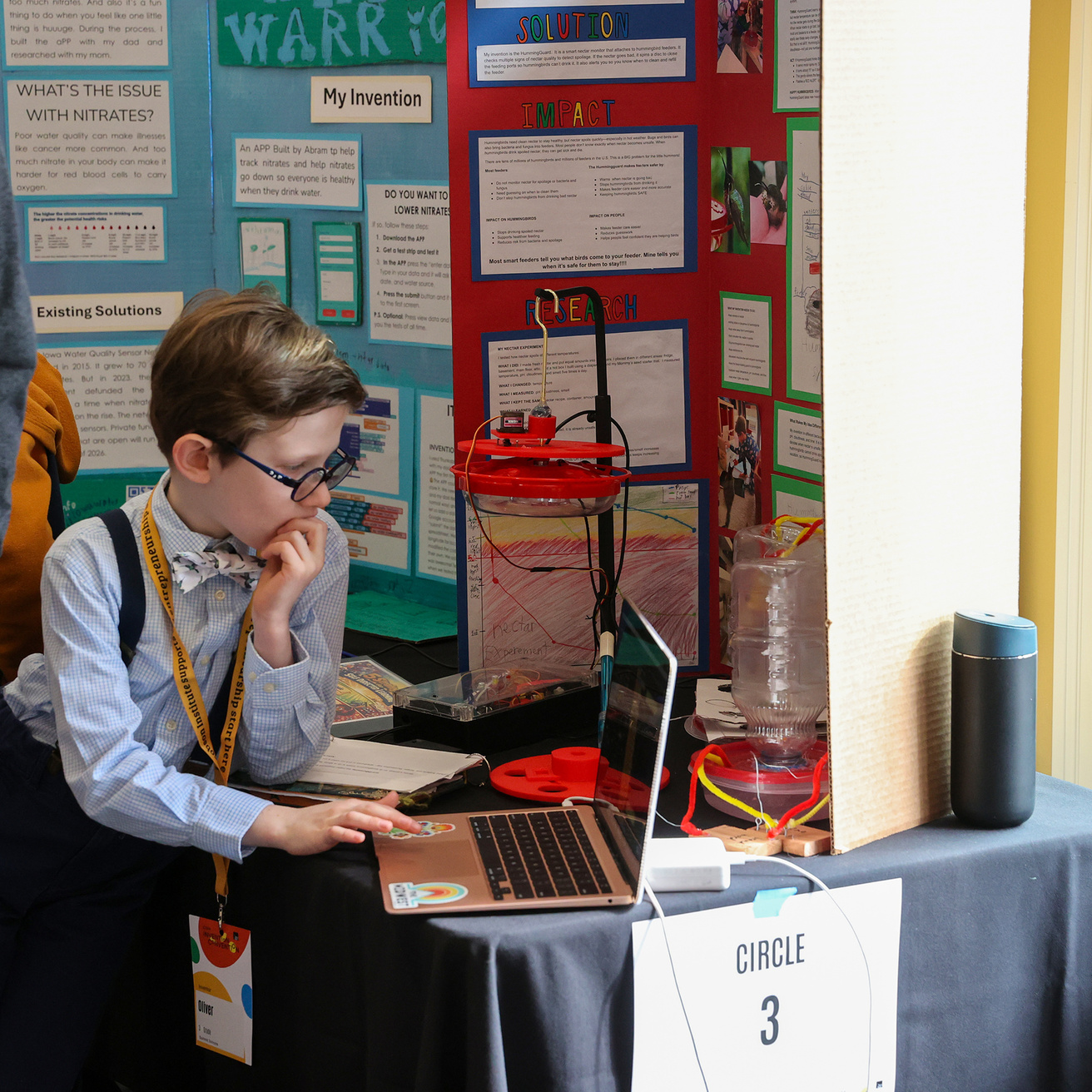 Oliver preparing his presentation
