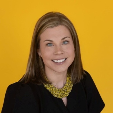 Headshot photo of Kate
