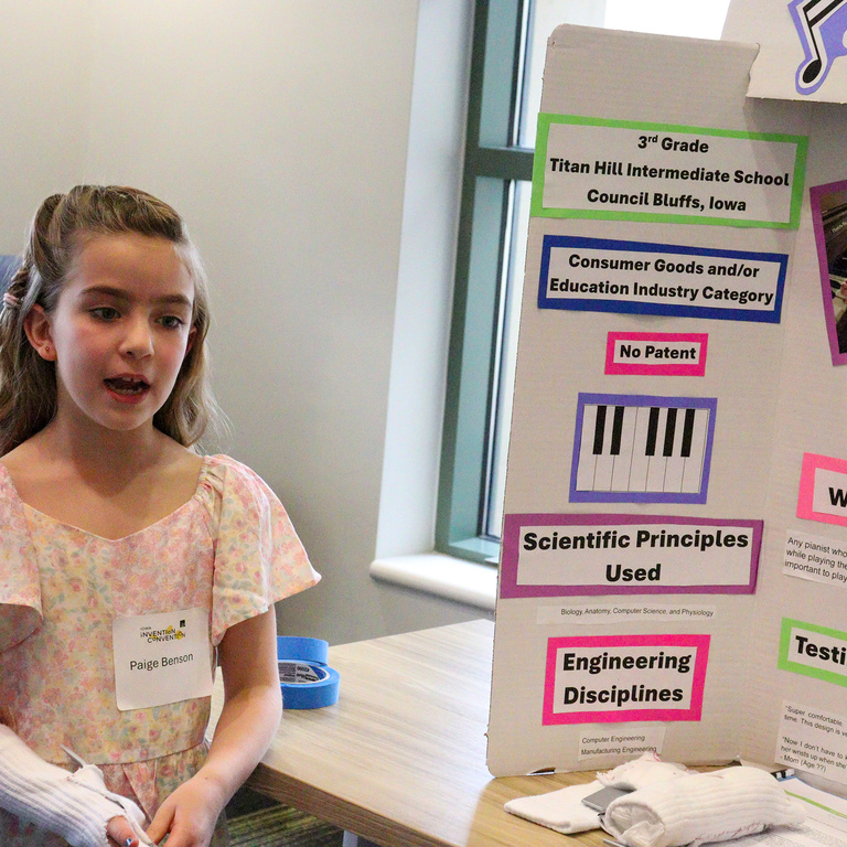 Paige presenting at the 2025 Iowa Invention Convention
