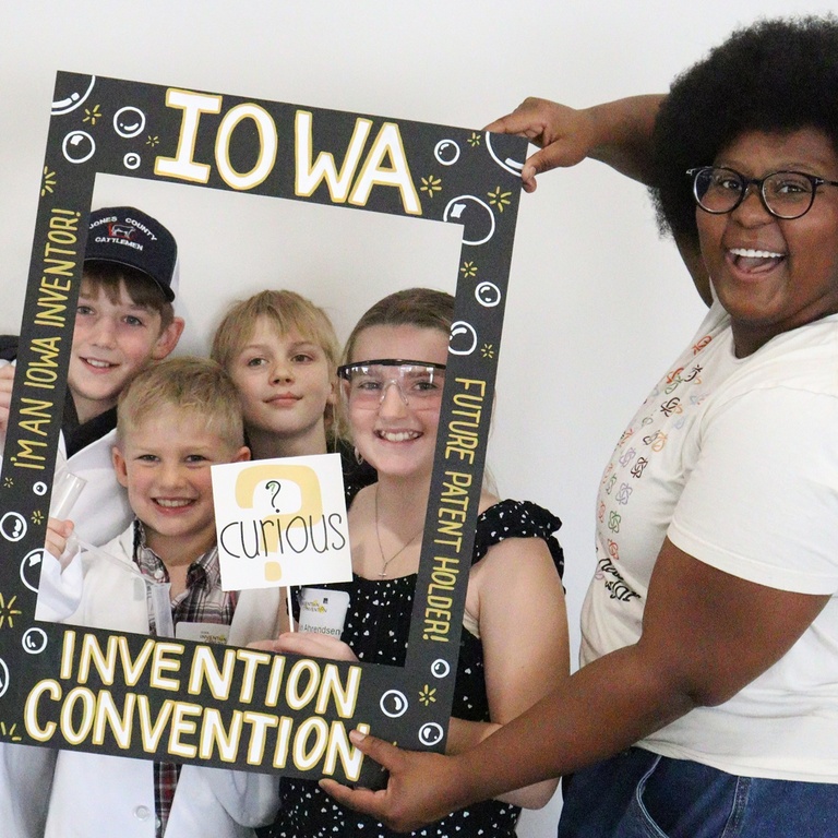 Iowa Invention Convention photo booth with Dasia and four inventors