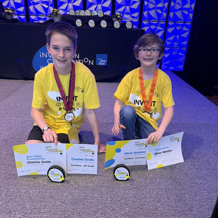 Charles and Oliver with awards at Invention Convention U.S. Nationals 2025