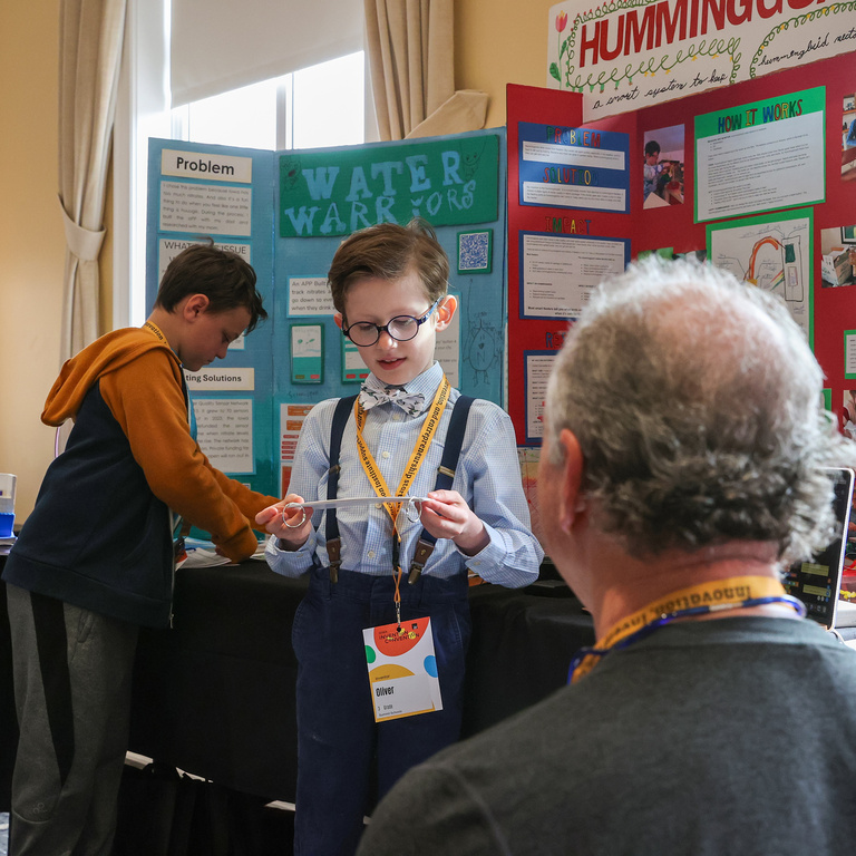 Student presenting at Iowa Invention Convention State Finals 2026