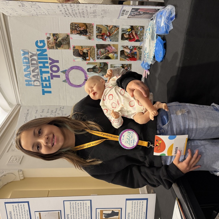 Isabella with her invention