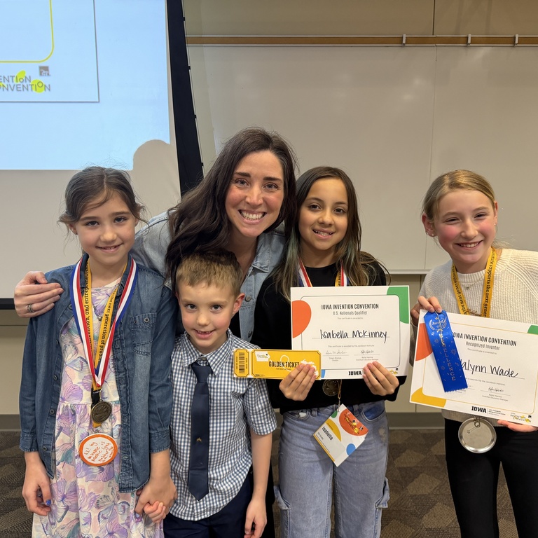 Invention coach, Mandy, with her four students