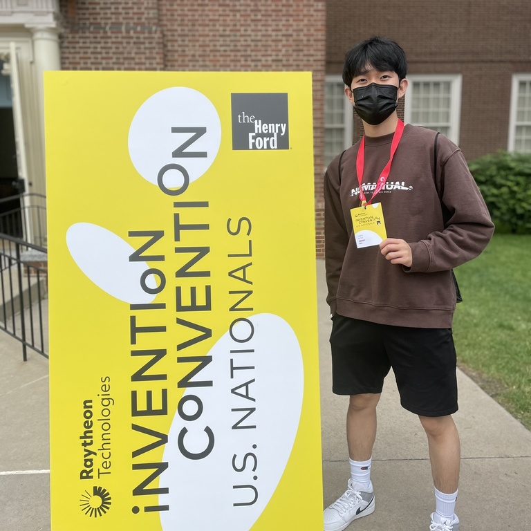 Jason at nationals with nationals sign