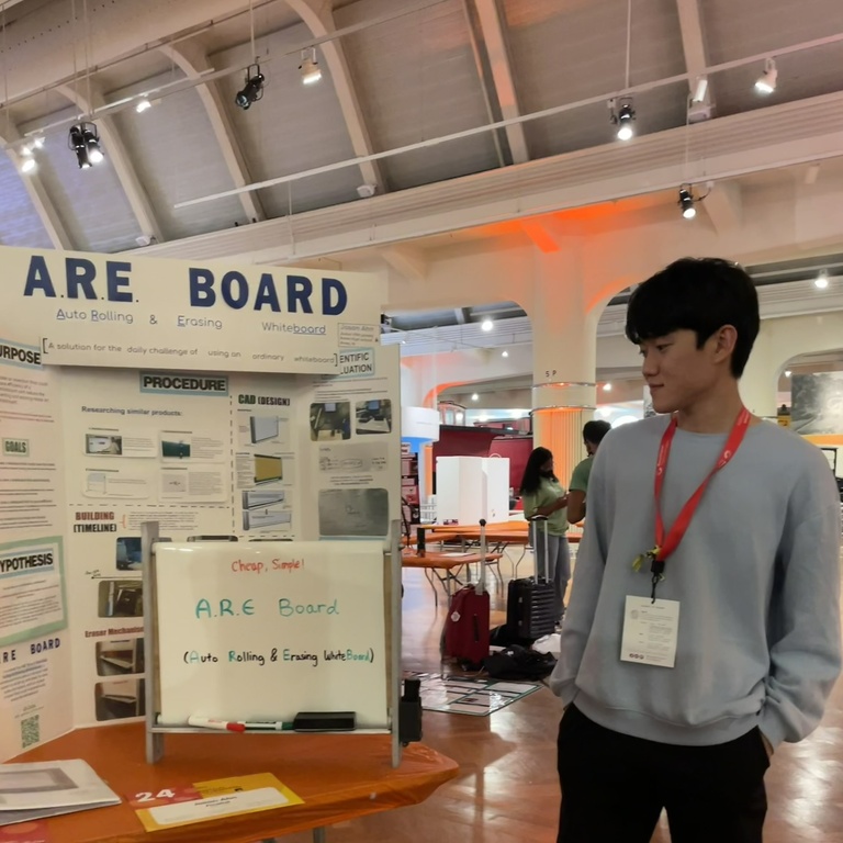 Jason with display board for ARE Board