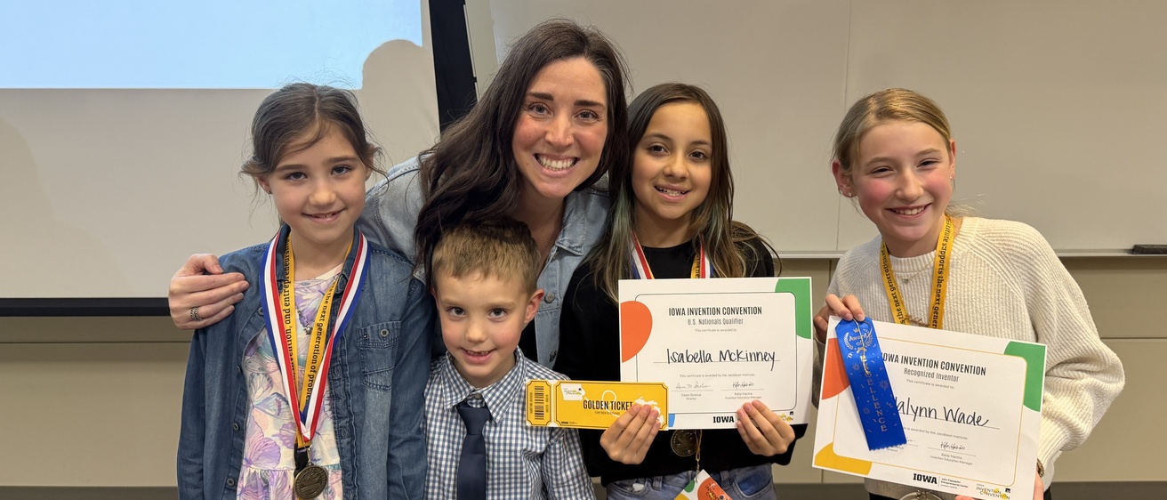 Mandy and her students smiling after winning awards for state and nationals
