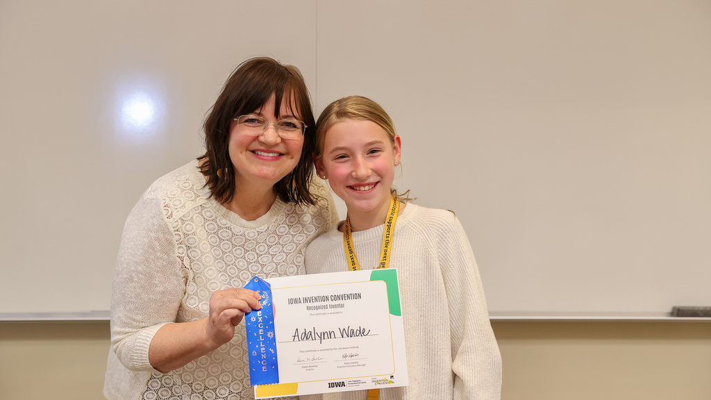Adalynn Wade accepting her award as a Recognized Inventor