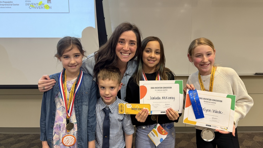 Mandy and her students smiling after winning awards for state and nationals